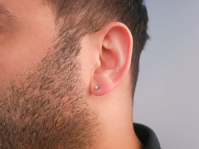 Boucle d'oreille homme solitaire diamant 0,02 carat en or blanc 14 carats