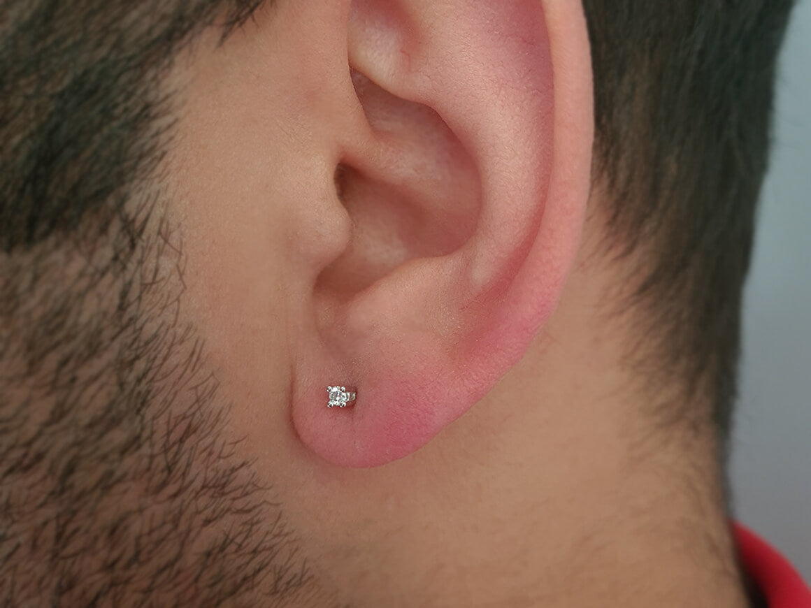 0.04 carat diamond solitaire men's earring in 585 14 carat white gold 