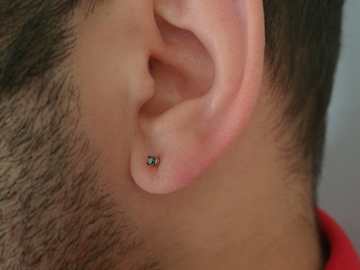 0.04 carat black diamond solitaire men's earring in 585 14 carat white gold 