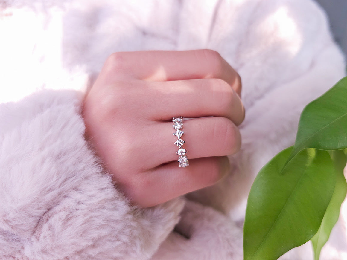 0.72 carat diamond half-round ring
