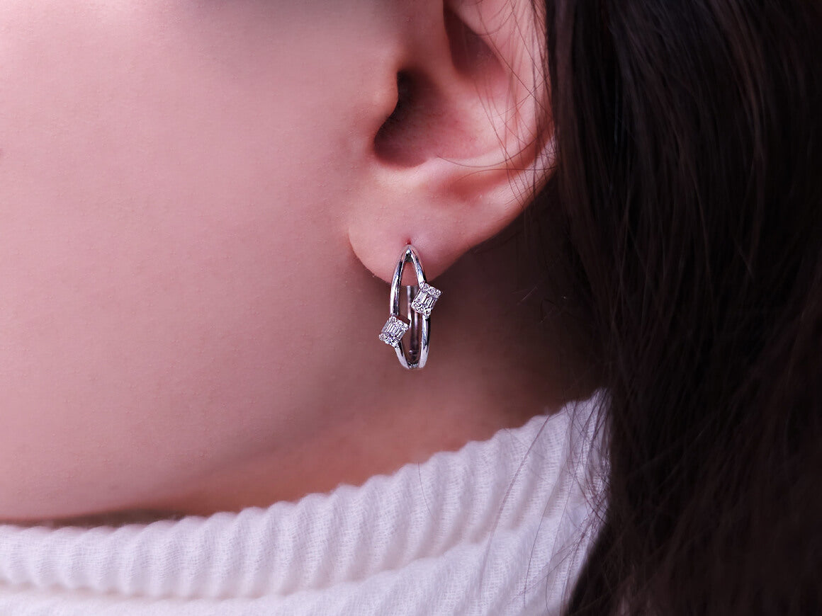 0.20 carat baguette diamond earrings in 14 carat white gold