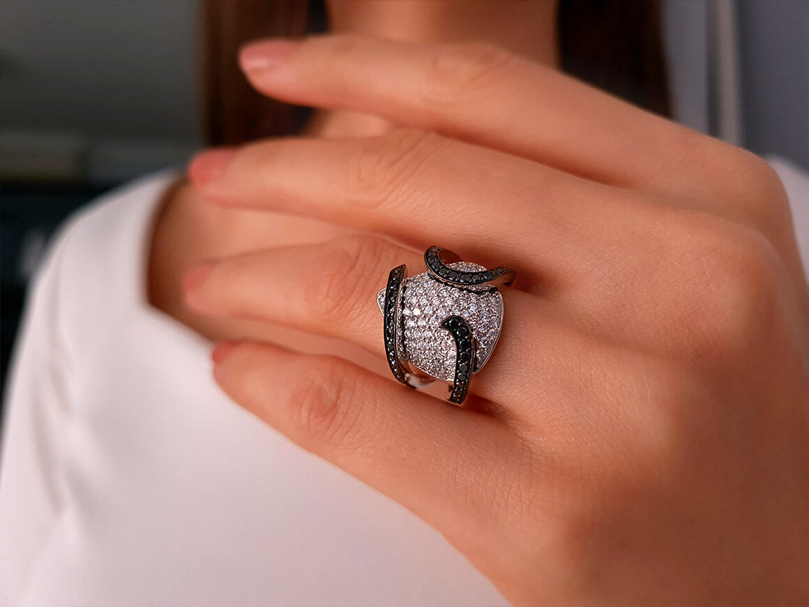 White and black diamond design ring in 14 carat white gold
