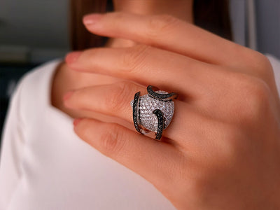White and black diamond design ring in 14 carat white gold