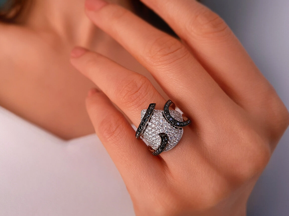 White and black diamond design ring in 14 carat white gold