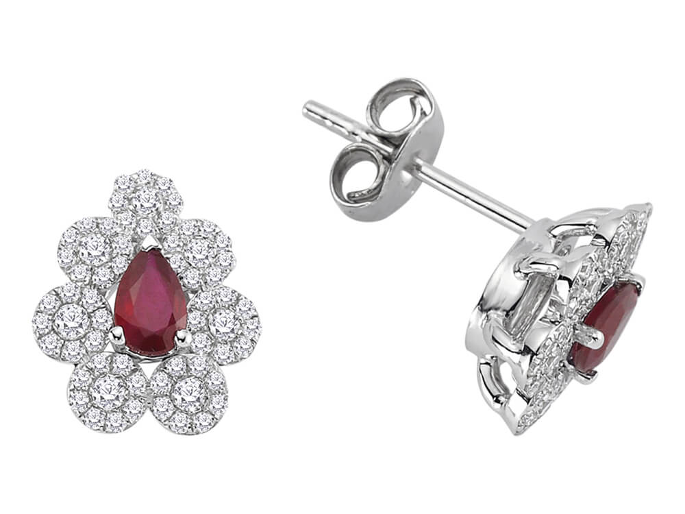 Diamond and drop ruby flower earrings in 14 carat white gold