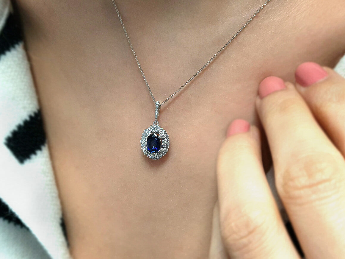 Two-row diamond and oval sapphire necklace