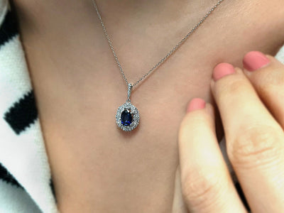 Two-row diamond and oval sapphire necklace