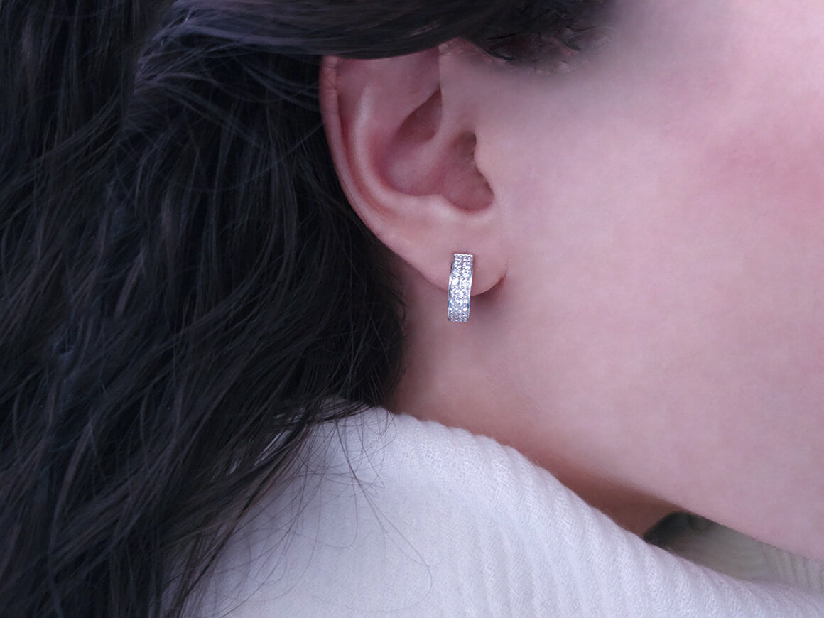 two rows of diamond earrings in white gold