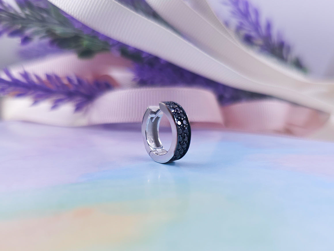 two rows of black diamond men's hoop earrings in white gold
