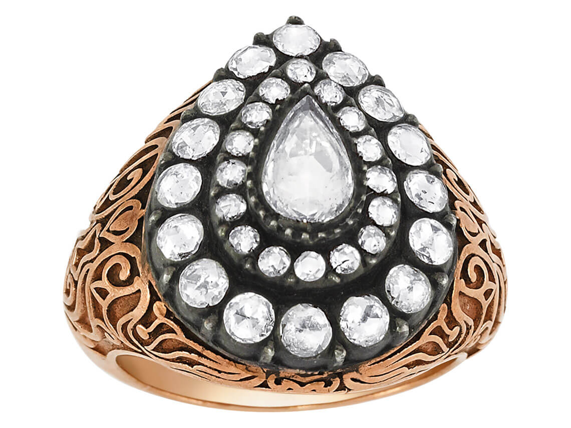 Sultani ring with pear-shaped and round diamonds