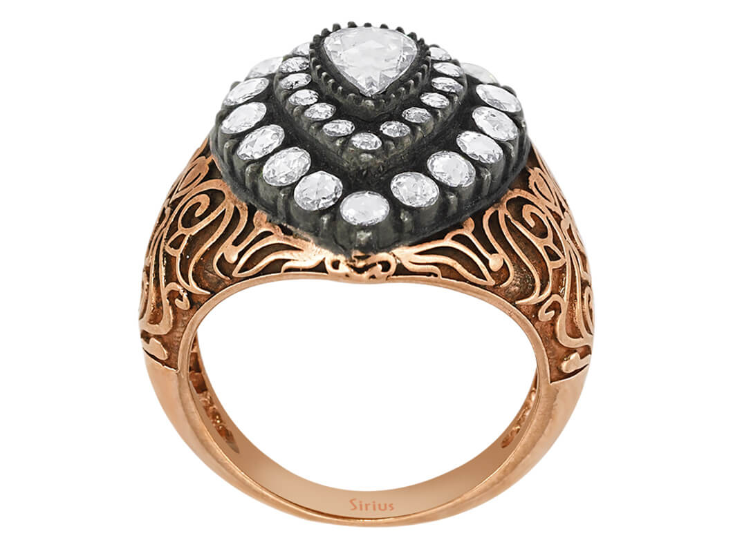 Sultani ring with pear-shaped and round diamonds