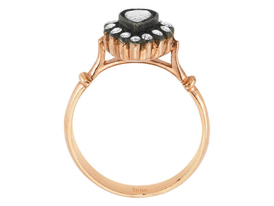 Pear and round diamond ring
