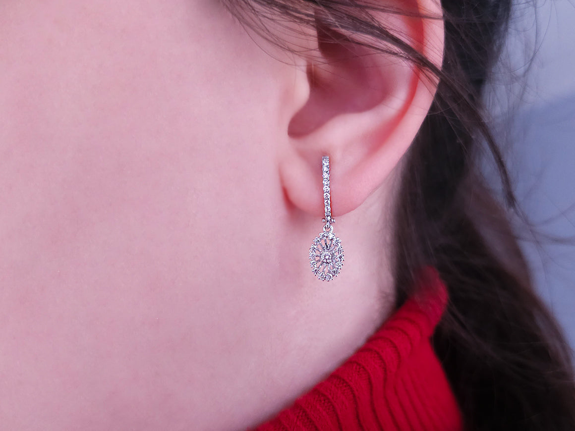 Diamond bridal flower earrings in 14 carat white gold