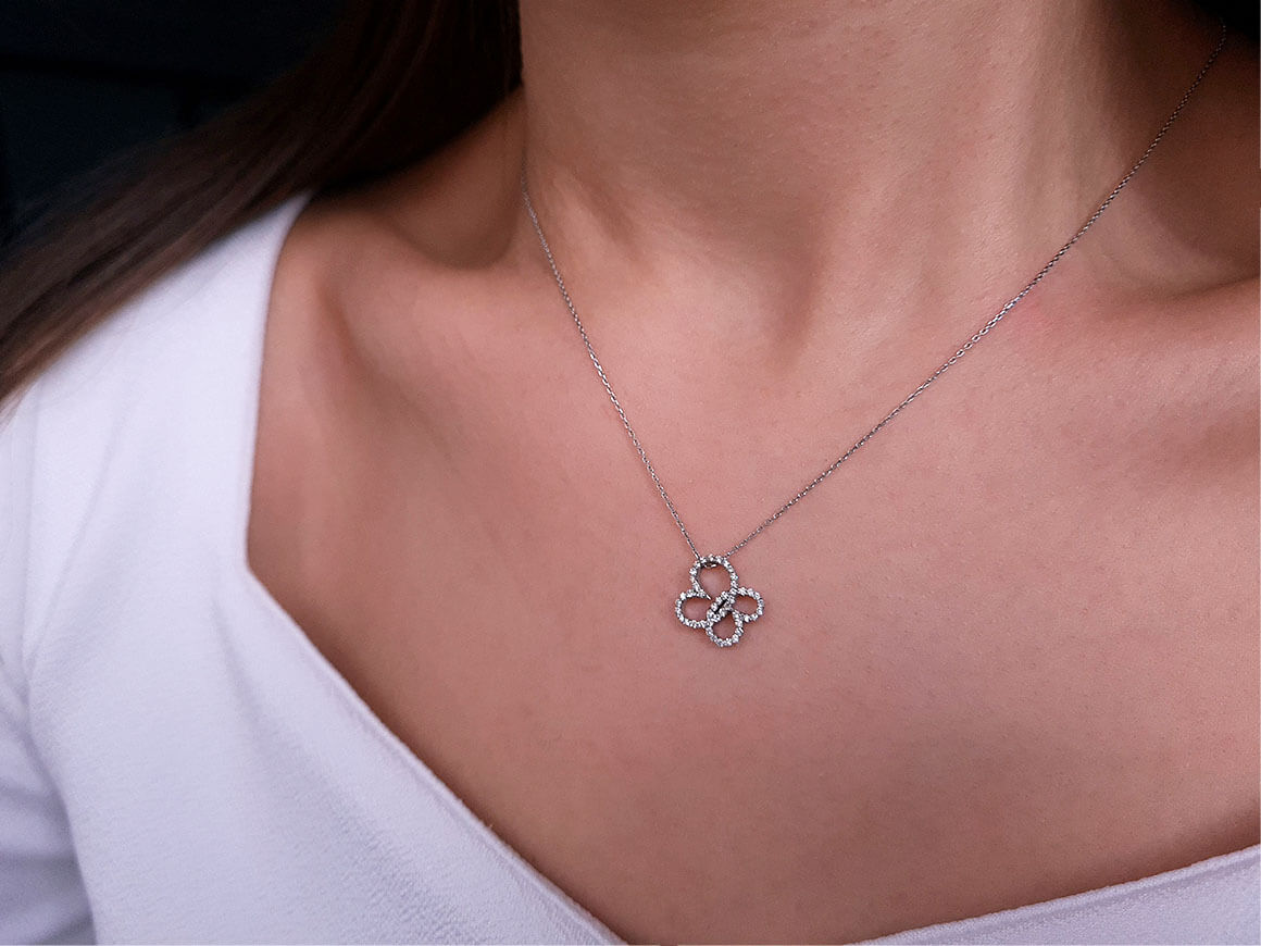 G color 0.23 carat diamond butterfly necklace in 333 8 carat white gold