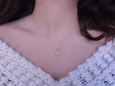 Diamond crocus flower jewelry set in 14 carat white gold.