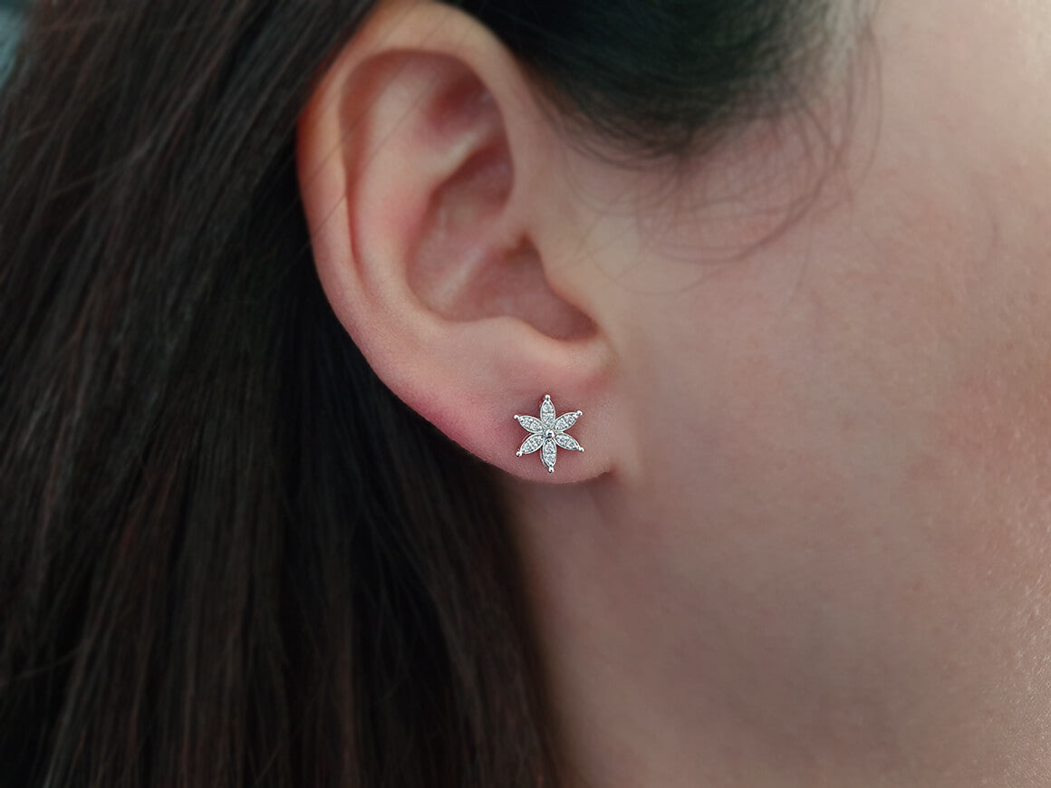 Diamond crocus flower jewelry set in 14 carat white gold.