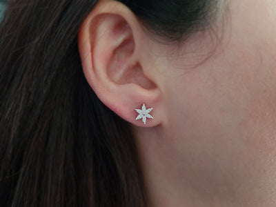 Diamond crocus flower jewelry set in 14 carat white gold.