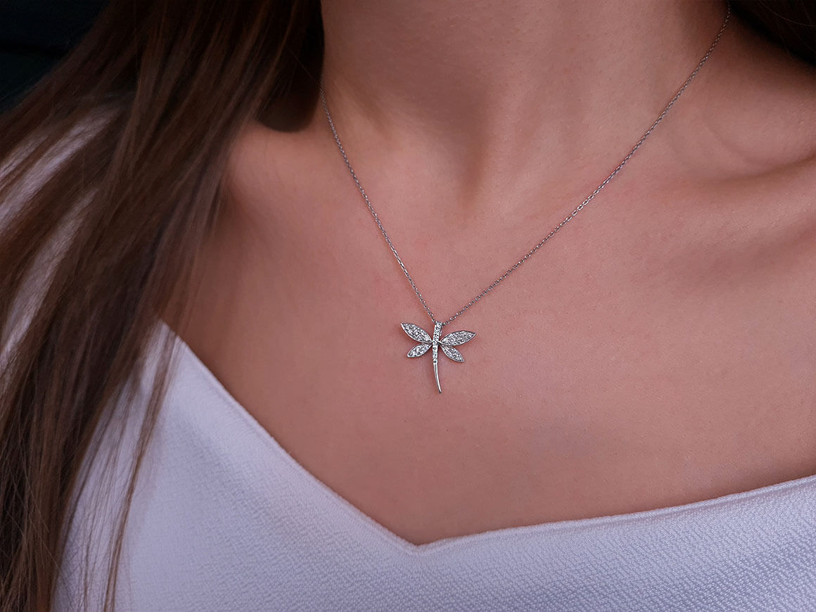 0.14 carat diamond dragonfly necklace in 333 8 carat white gold