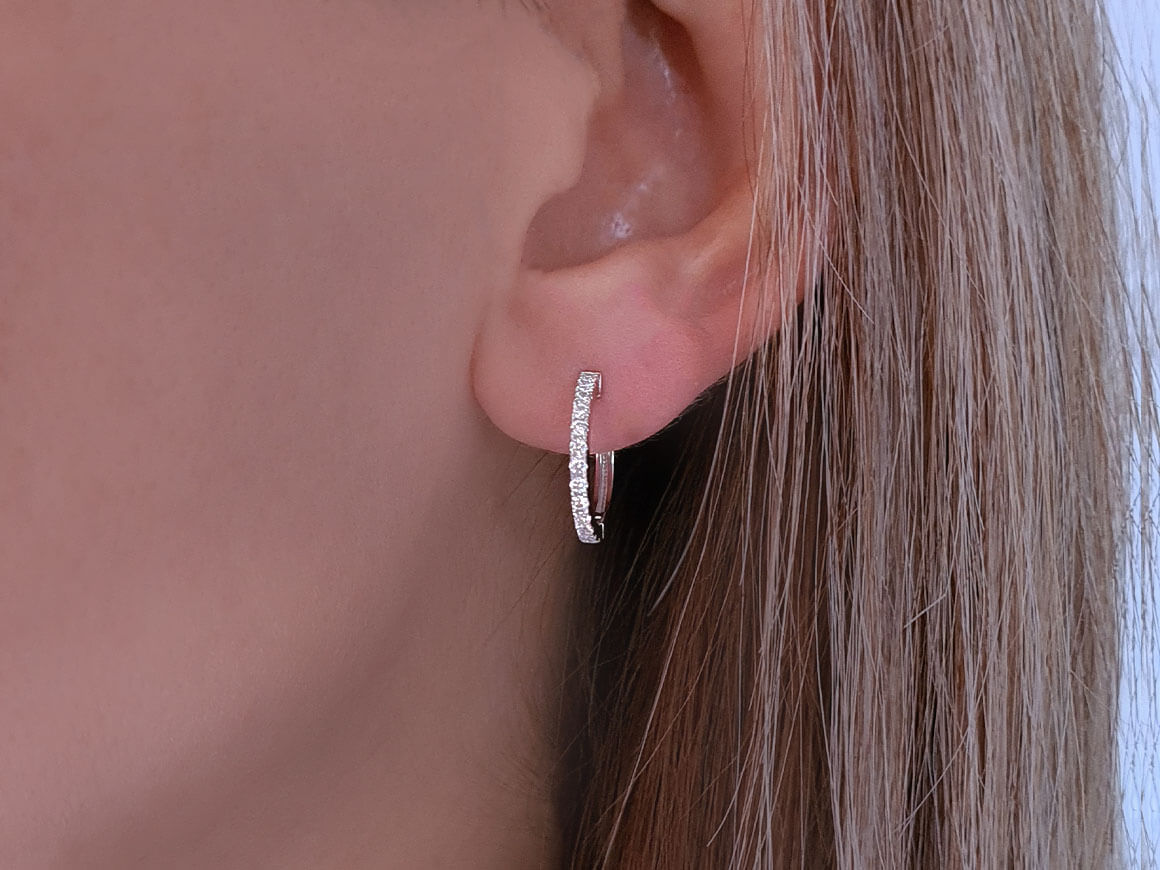0.29 carat diamond hoop earrings in 14 carat white gold