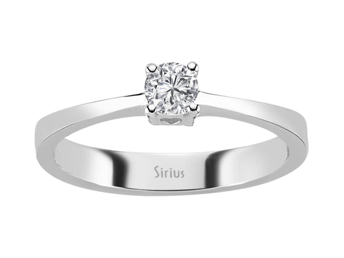 0.17 carat diamond heart motif solitaire ring in 18K white gold