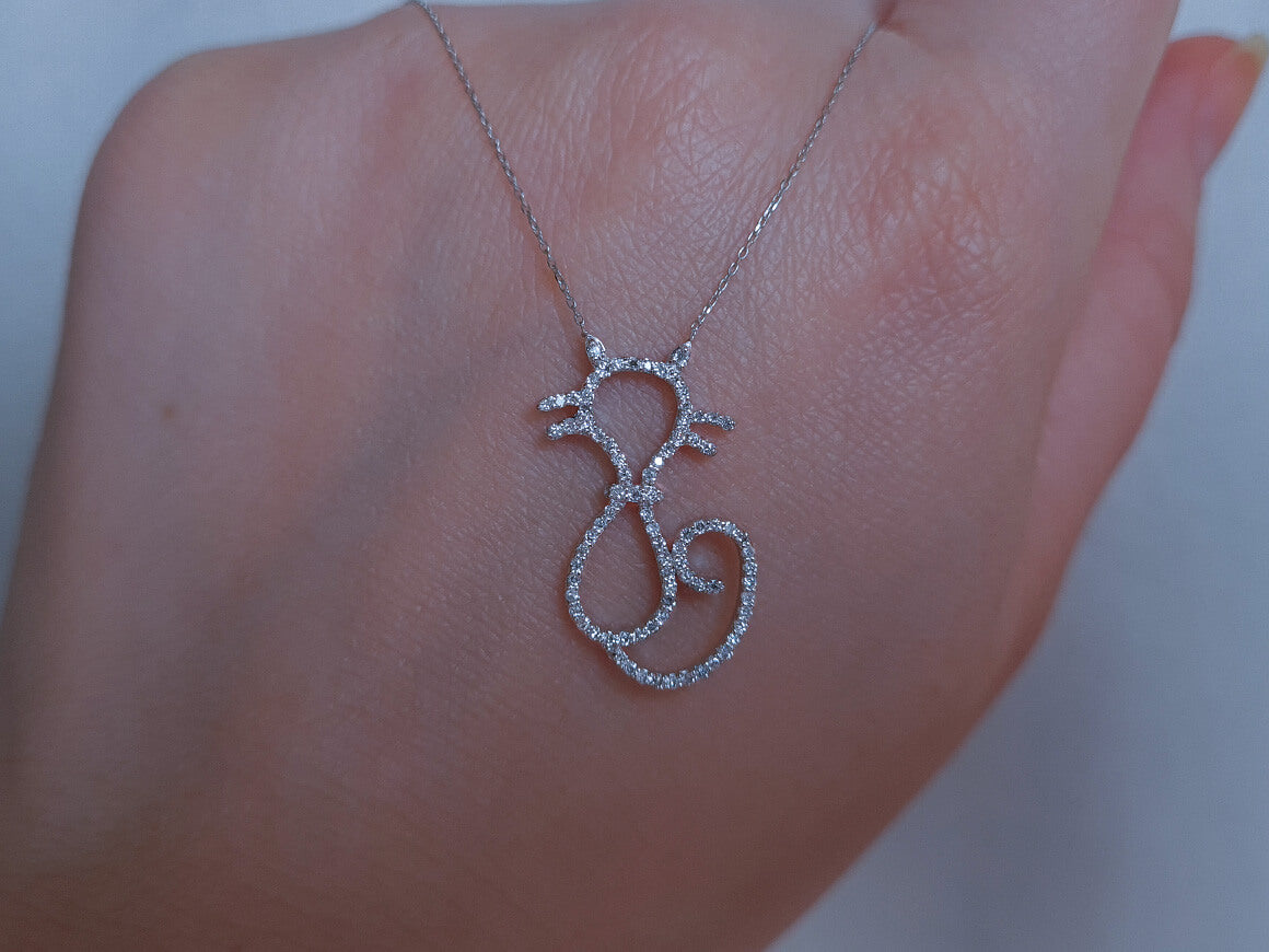 0.23 carat diamond cat necklace in 14 carat white gold