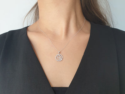 0.26 carat diamond moon and stars necklace in 14 carat white gold