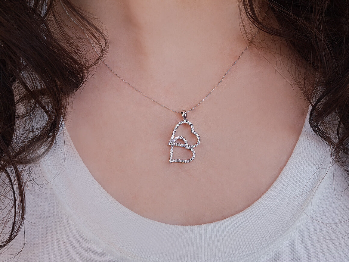 Collier double cœur en diamant