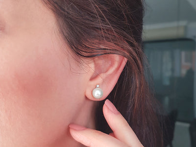 Diamond and natural pearl earrings in 8 carat white gold