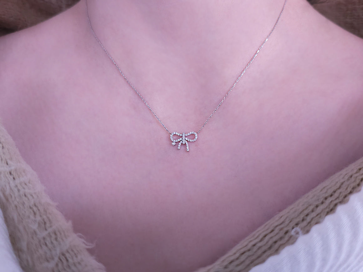 Diamond bow necklace