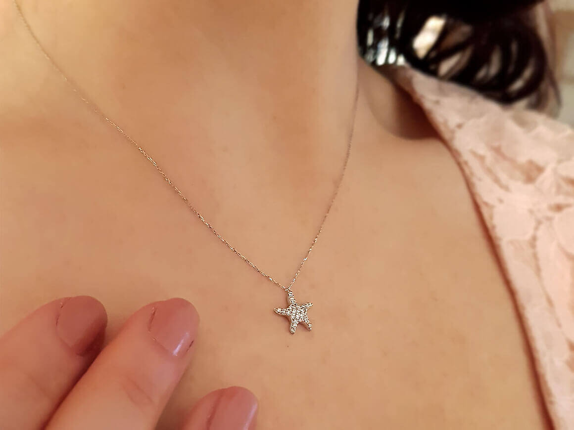Diamanten Seestern Halskette in 750er 18 K Weißgold - handgefertigter Diamantschmuck aus Feingold | Sirius Diamant
