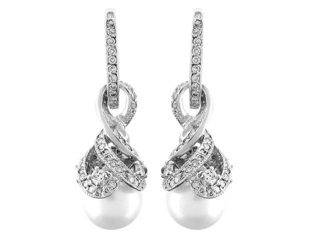 Diamond and pearl earrings in 14 carat white gold