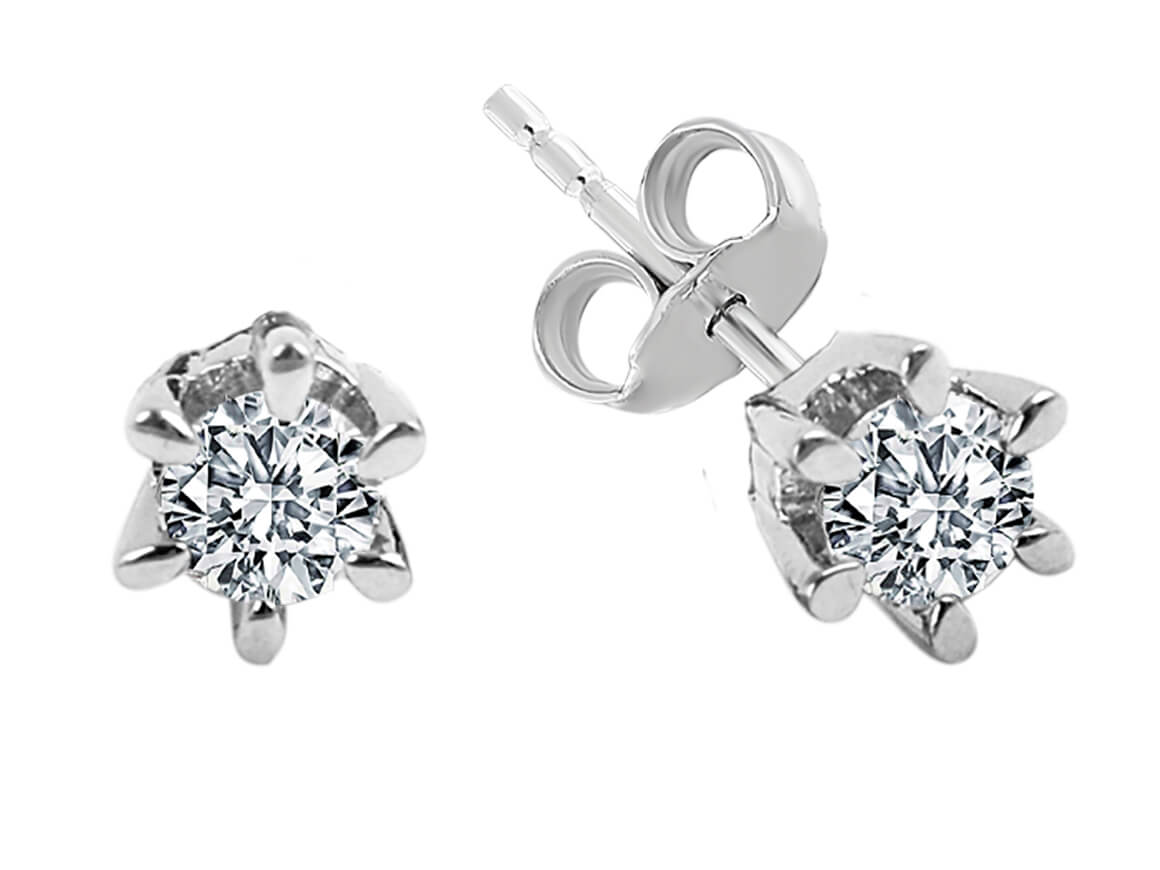 0.54 total carat diamond solitaire stud earrings in 14 carat white gold