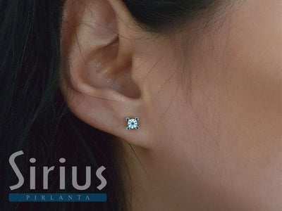 0.41 carat diamond solitaire earrings