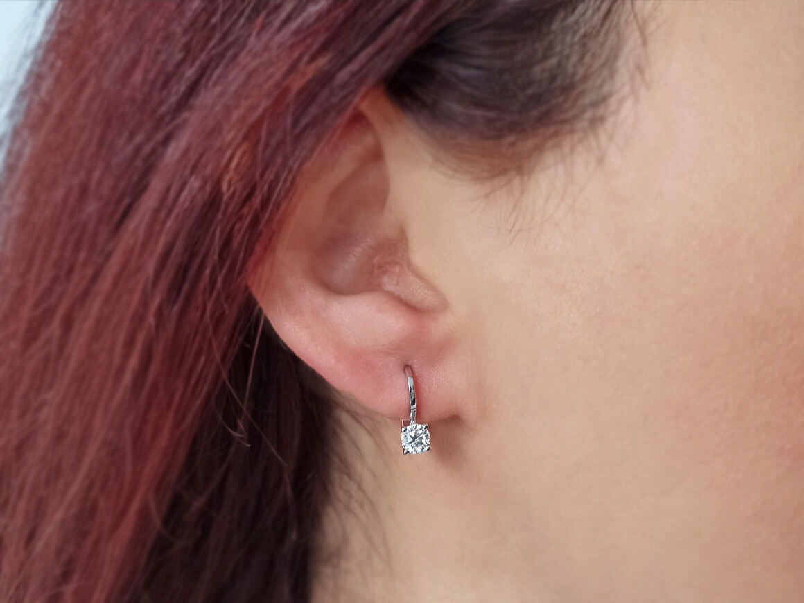 0,62 Karat Diamant Solitär Ohrringe - handgefertigter Diamantschmuck aus Feingold | Sirius Diamant