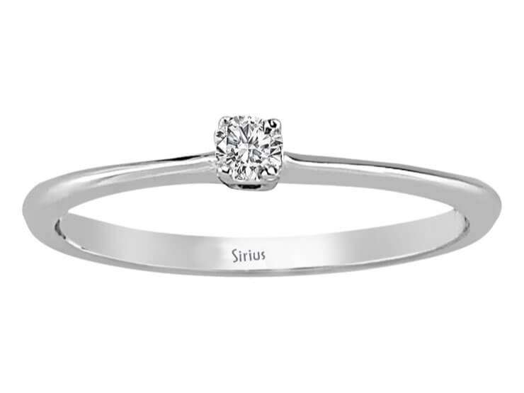 0.06 carat diamond solitaire ring in 333 8 carat white gold