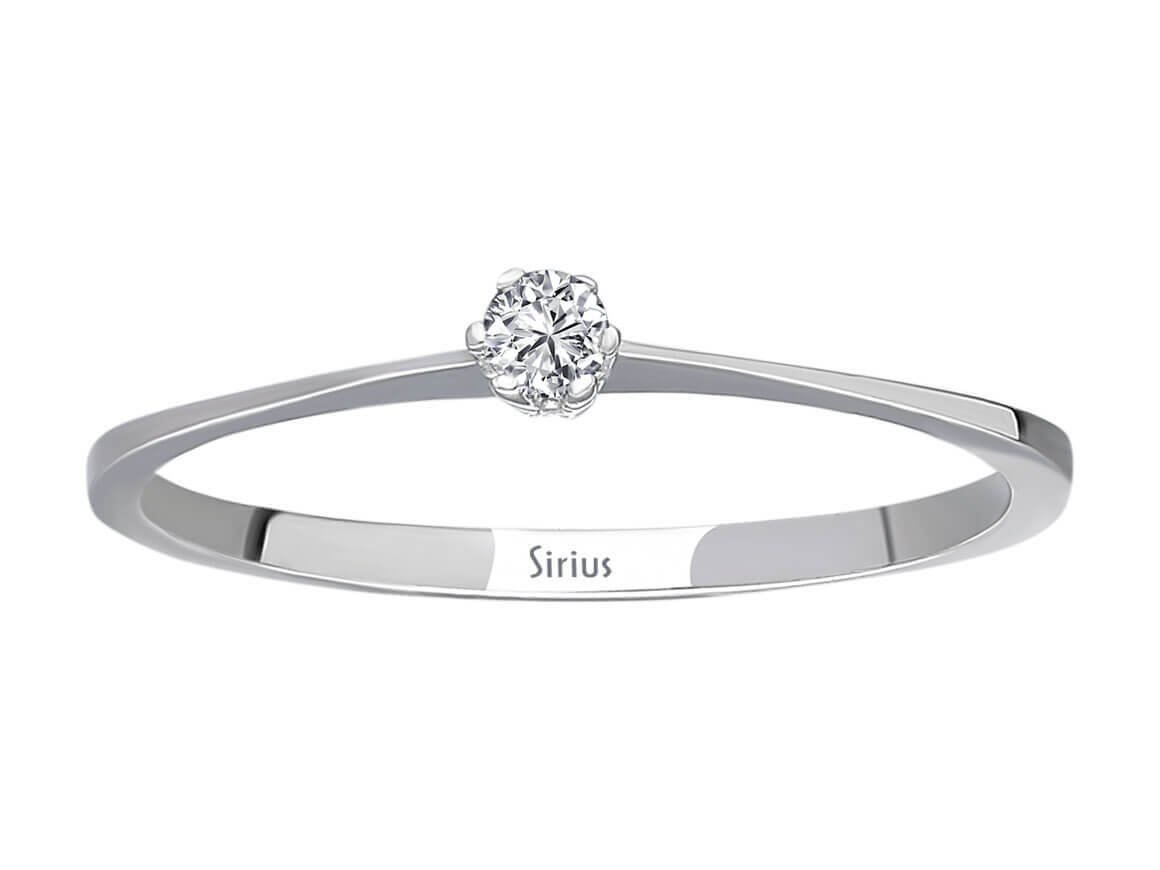 0.05 carat diamond solitaire ring in 18K white gold