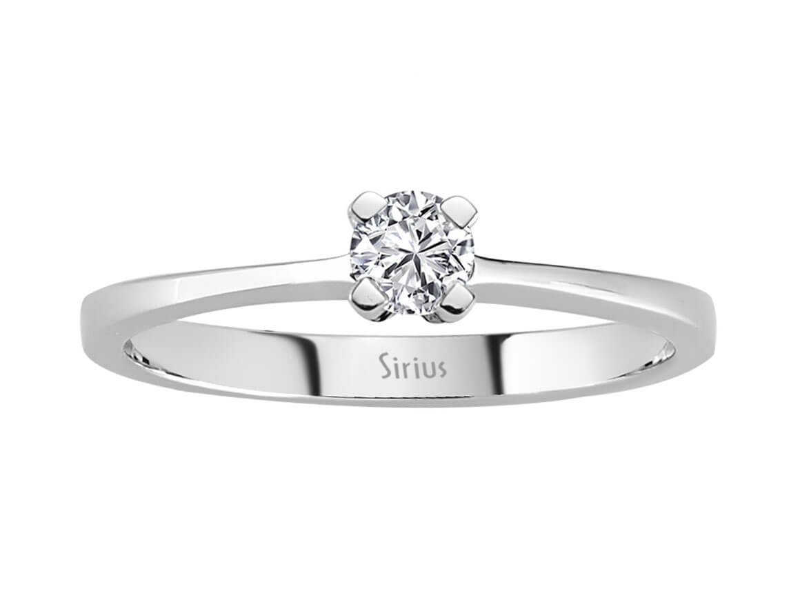 0.22 carat diamond solitaire ring in 14 K white gold