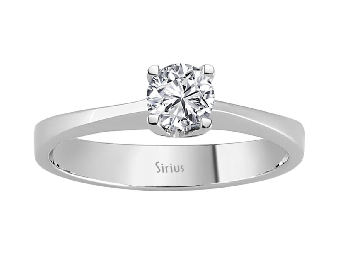 0.47 carat diamond solitaire ring in 14 K white gold