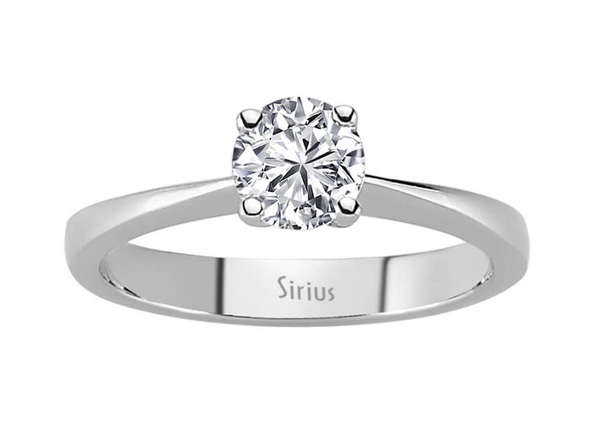 0.60 carat diamond solitaire ring in 14 K white gold