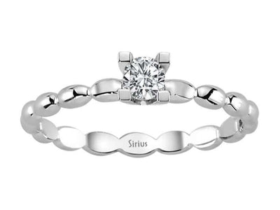 0.18 carat diamond solitaire ring in 18 carat white gold