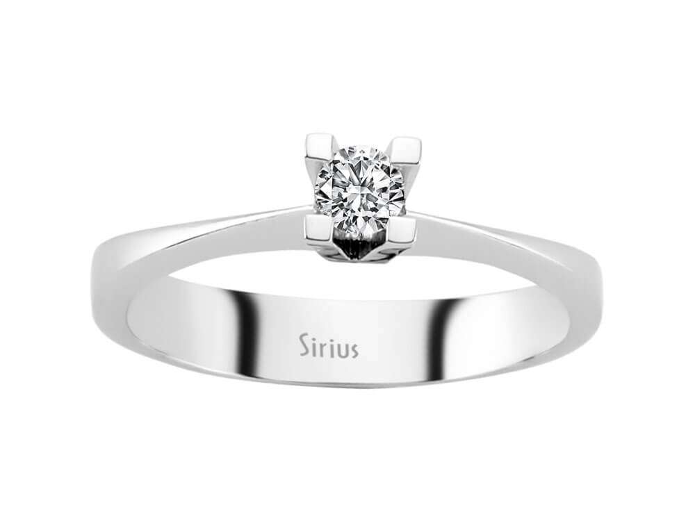 0.16 carat diamond solitaire ring in 18 K