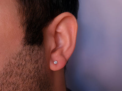 0.08 carat solitaire diamond stud earrings for men in 14 carat white gold