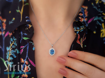 Collier diamant et topaze bleue en or 14 carats