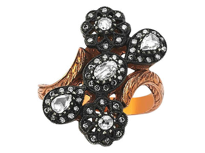 Diamond cut diamond ring in 8 carat red gold