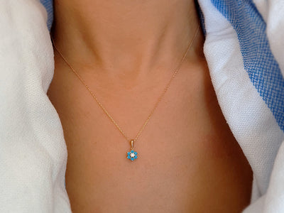 Diamond and turquoise daisy necklace in 333 8 K red gold