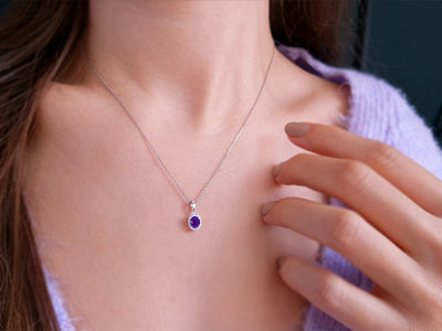 Diamond and oval amethyst jewelry set in 333 8K white gold