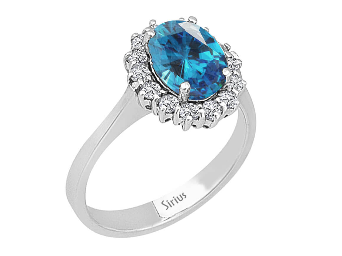 Diamond and oval cut blue topaz ring in 14 carat white gold