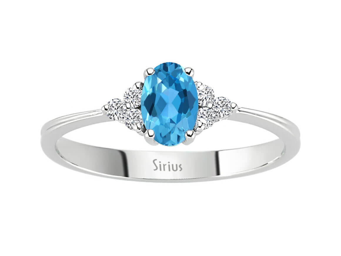 Diamond and blue topaz ring in 8 K white gold
