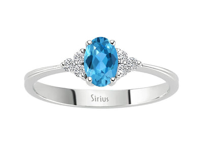 Diamond and blue topaz ring in 8 K white gold