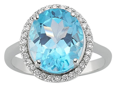 Diamond and Oval Blue Topaz Ring
